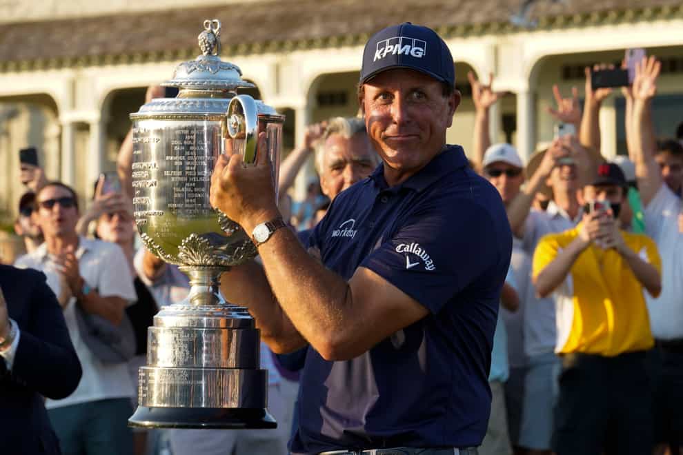 Phil Mickelson holds the Wanamaker Trophy after winning the US PGA Championship