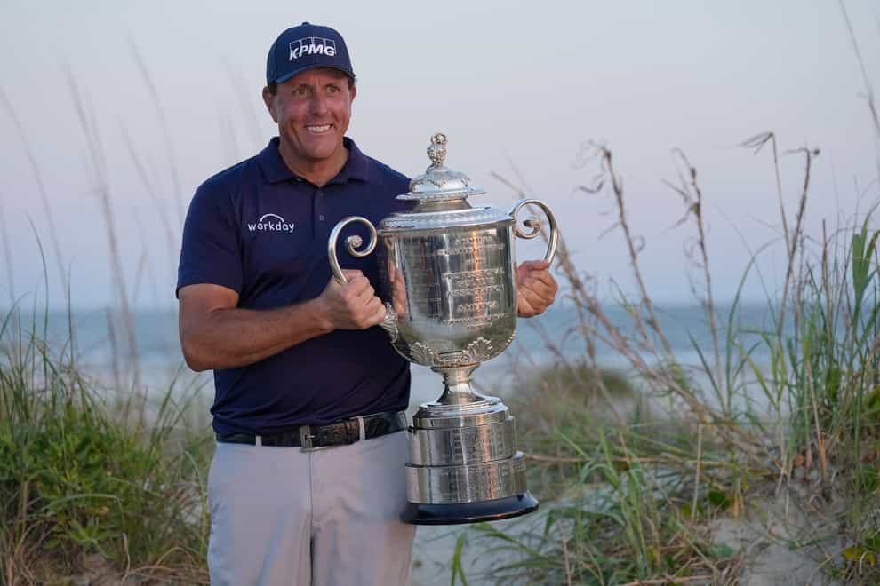 Phil Mickelson holds the Wanamaker Trophy after winning the PGA Championship on the Ocean Course