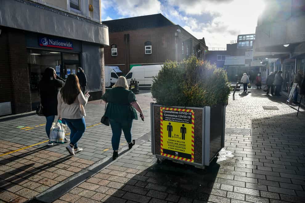 Shoppers in Merthyr Tydfil, the area with the highest seven-day coronavirus case rate in Wales