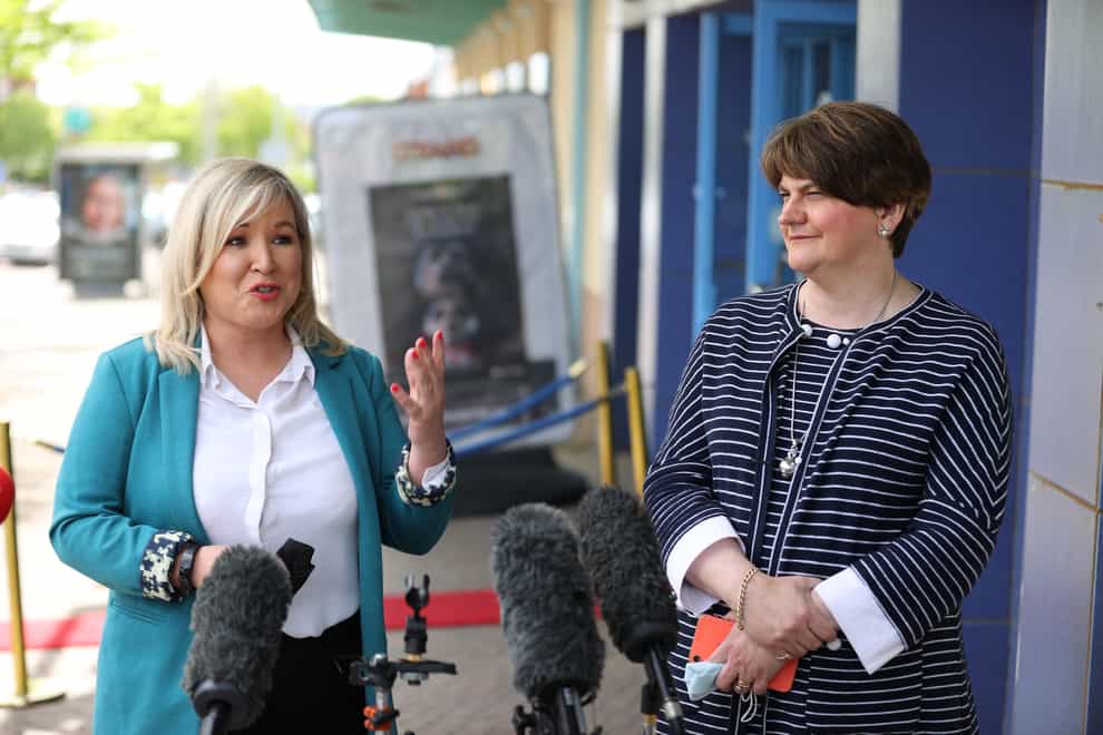 First Minister Arlene Foster (right) and Deputy First Minister Michelle O’Neill at the Strand Centre Cinema in east Belfast to mark the reopening of indoor arts venues, after the latest easing of the Covid-19 rules in Northern Ireland (Liam McBurney/PA)