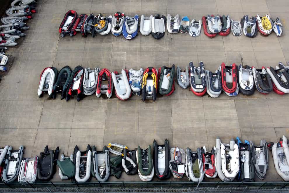 A view of boats used by people thought to be migrants are stored at a warehouse facility in Dover