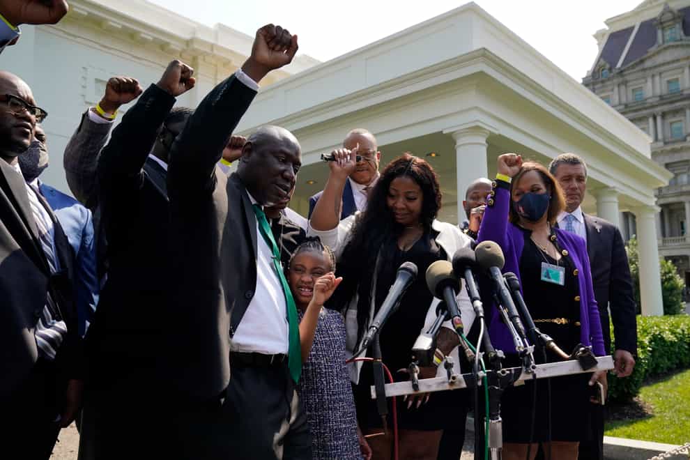 Lawyer Benjamin Crump, George Floyd's daughter Gianna, her mother Roxie Washington and others talk with reporters after meeting President Joe Biden at the White House