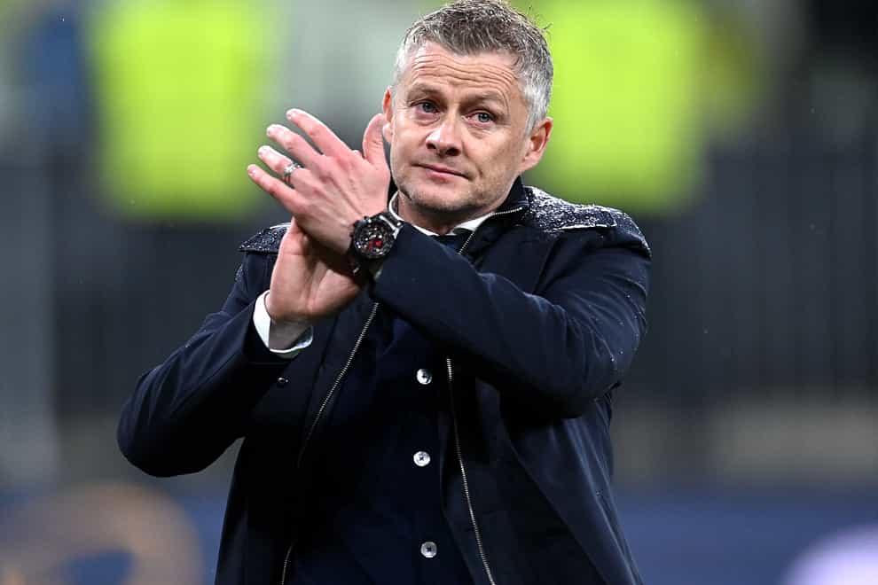 Manchester United manager Ole Gunnar Solskjaer gestures to the fans after the UEFA Europa League final, at Gdansk Stadium