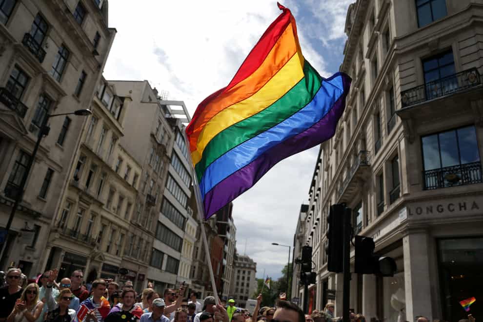 A rainbow flag during a Pride parade