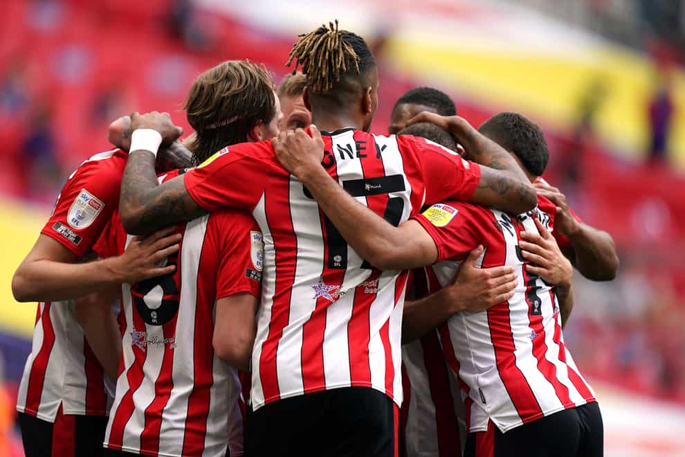 Brentford celebrate their second goal at Wembley from Emiliano Marcondes, hidden