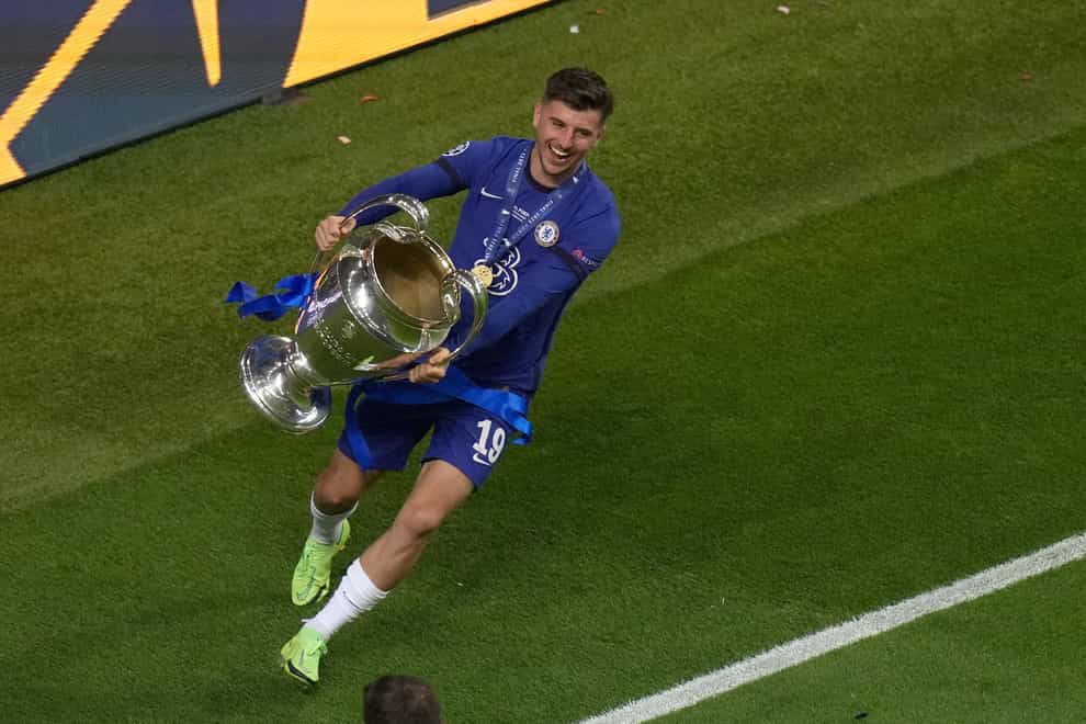 Chelsea’s Mason Mount celebrates with the trophy