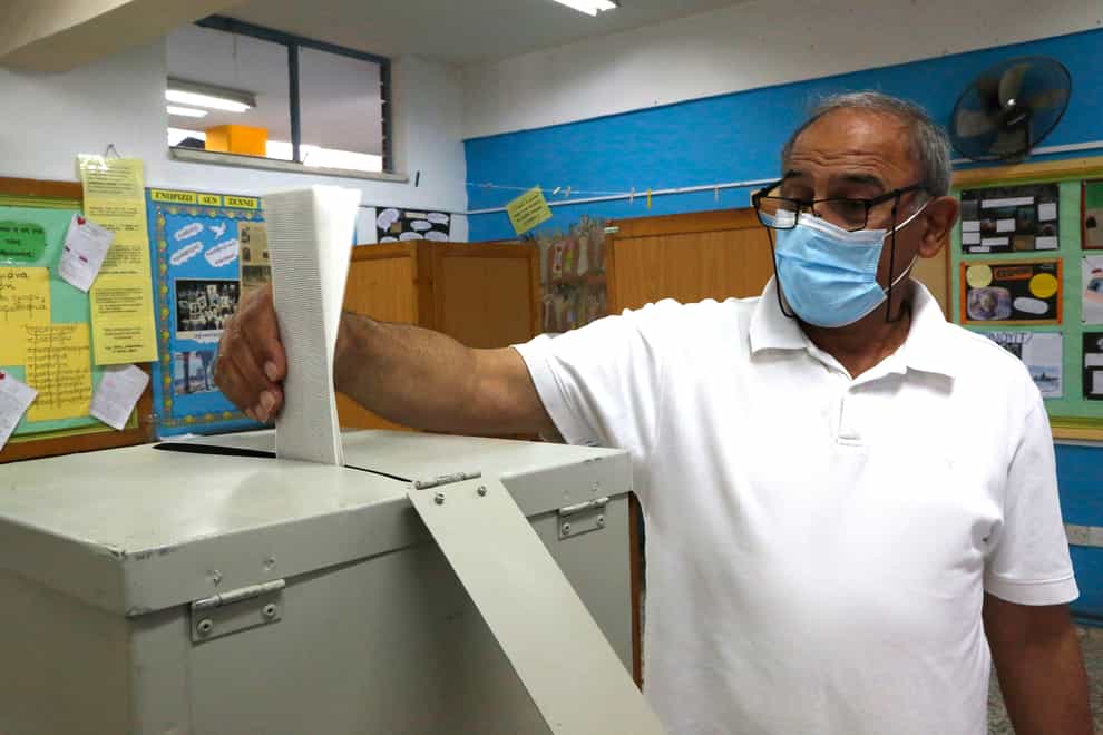 Man casts vote in Cyprus election