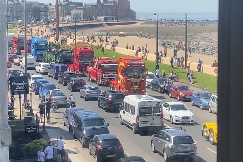 A convoy in memory of George Arthur Hinds makes its way through Morecambe