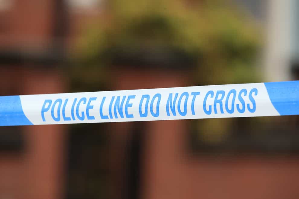 Police tape across a crime scene