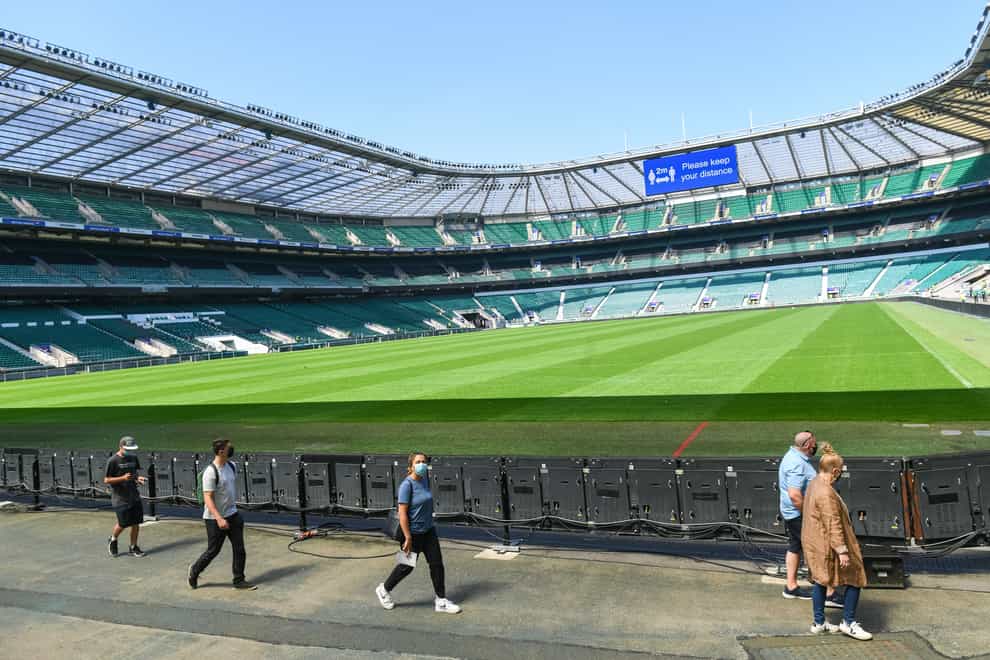 Members of the public arrive to receive a coronavirus vaccination at Twickenham rugby stadium