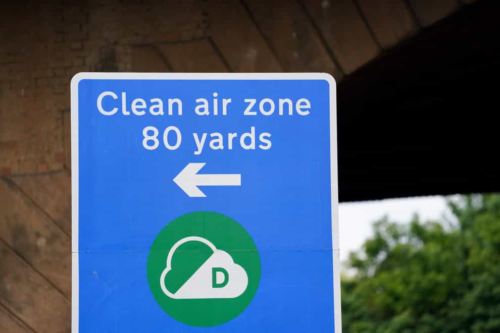 Signs in Birmingham informing road users of the Clean Air Zone initiative