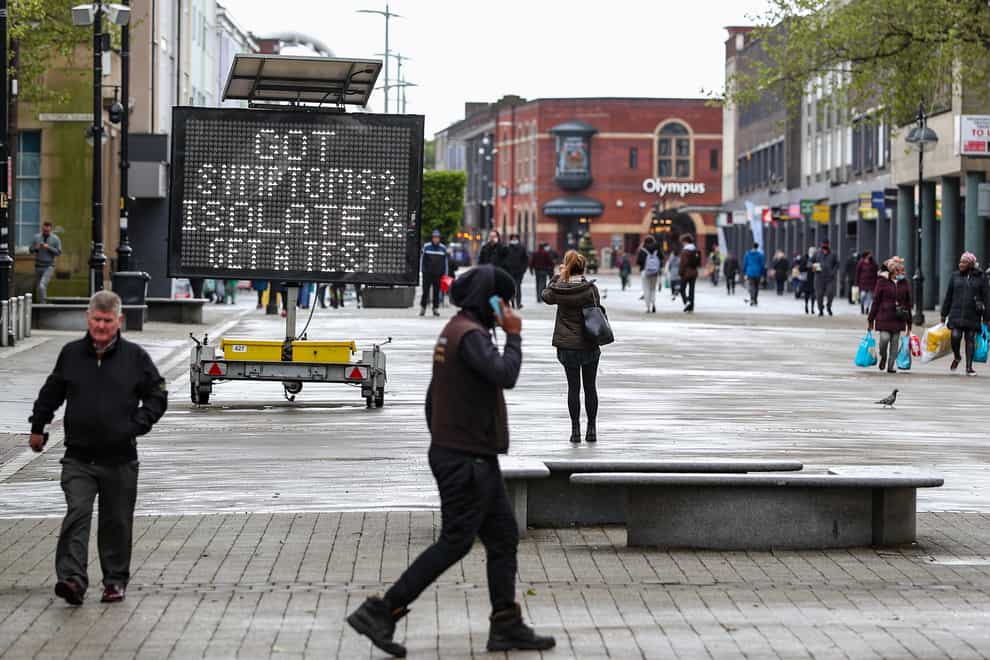 An electronic notice board in Bolton town centre, one of the areas of the UK where the Covid variant first identified in India is concentrated (Peter Byrne/PA)