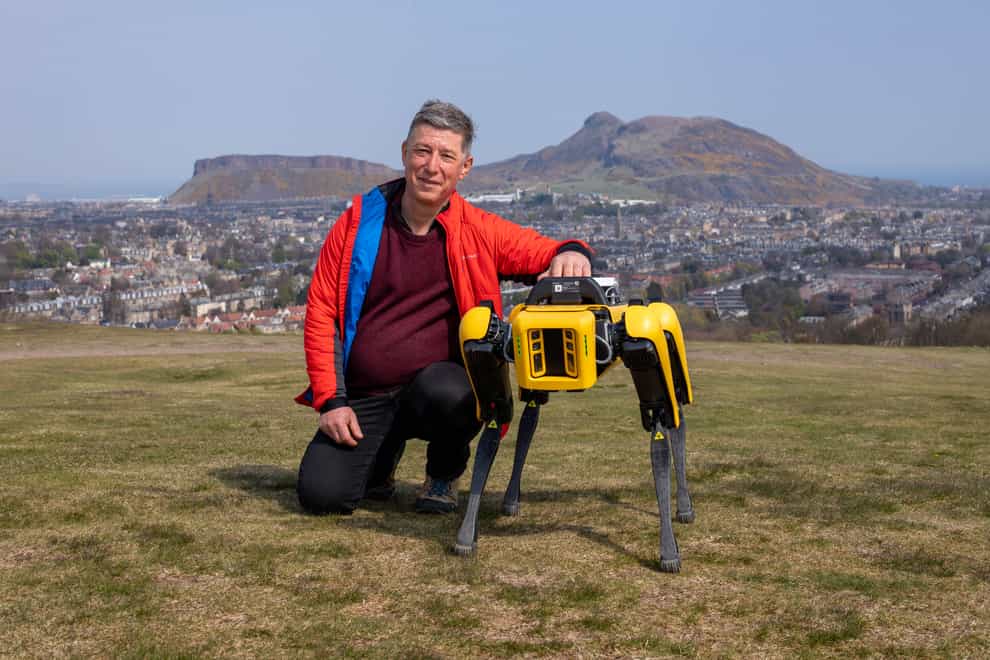 Professor Yvan Petillot with the robot