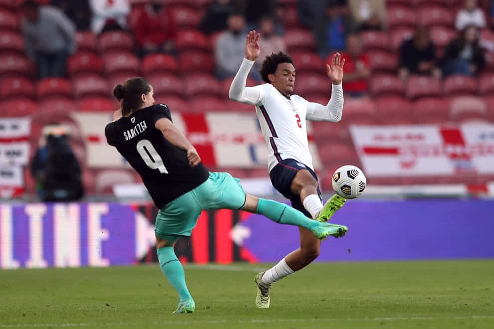 Austria’s Marcel Sabitzer and England’s Trent Alexander-Arnold battle for the ball