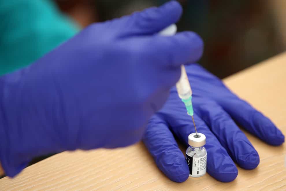 <p>Nurse prepares Pfizer/BioNTech vaccine</p>