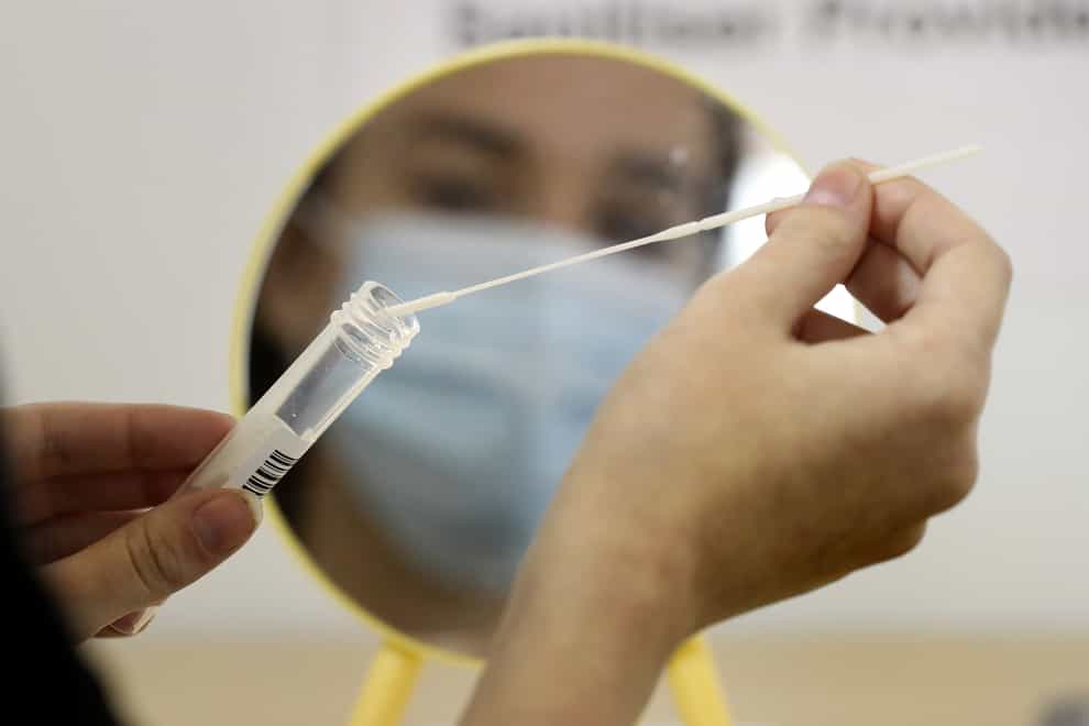 A person undertaking a coronavirus test
