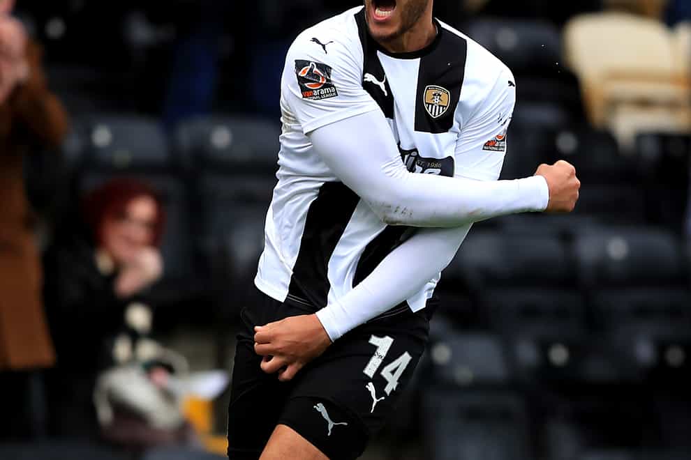 Kyle Wootton's double helped Notts County overcome Chesterfield.