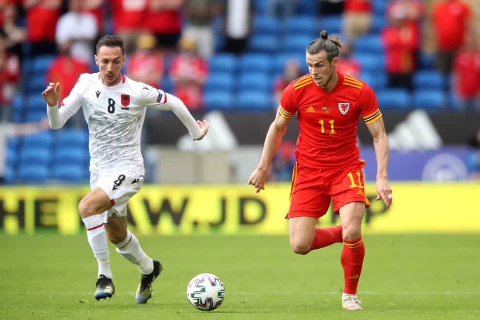 Wales’ Gareth Bale, right, and Albania’s Sherif Kallaku battle for the ball during their goalless draw in Cardiff