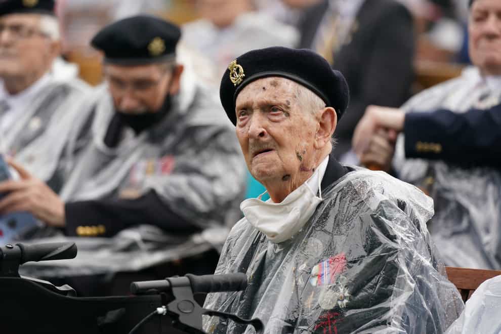 Veterans watch the official opening of the British Normandy Memorial