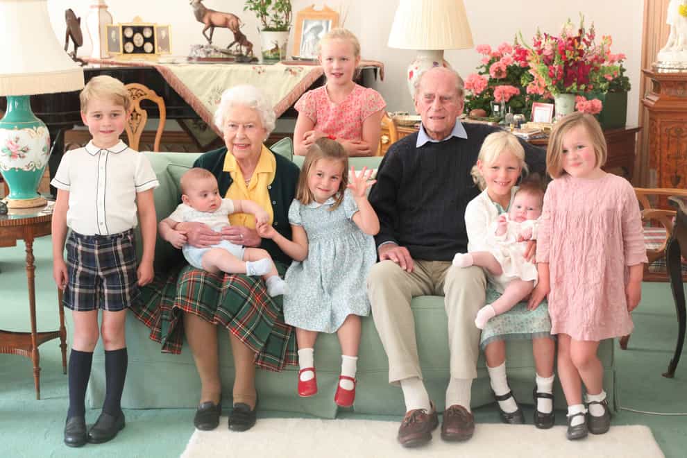 <p>The Queen and Philip with seven of their great grandchildren - Prince George, Prince Louis, Savannah Phillips, Princess Charlotte, Isla Phillips holding Lena Tindall, and Mia Tindall</p>