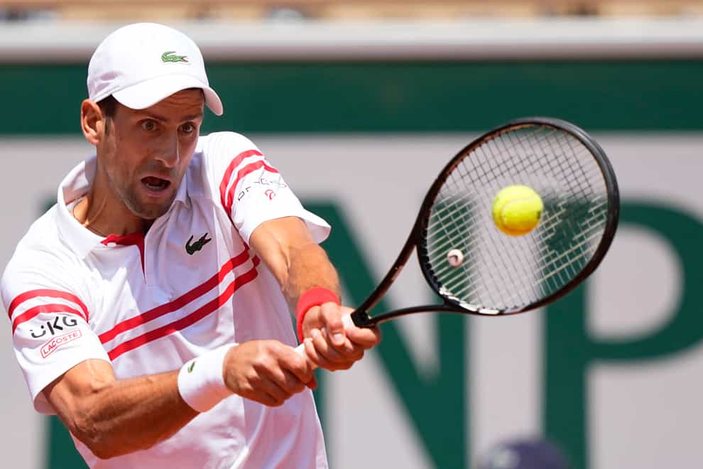 Novak Djokovic, pictured, battled back to beat Lorenzo Musetti