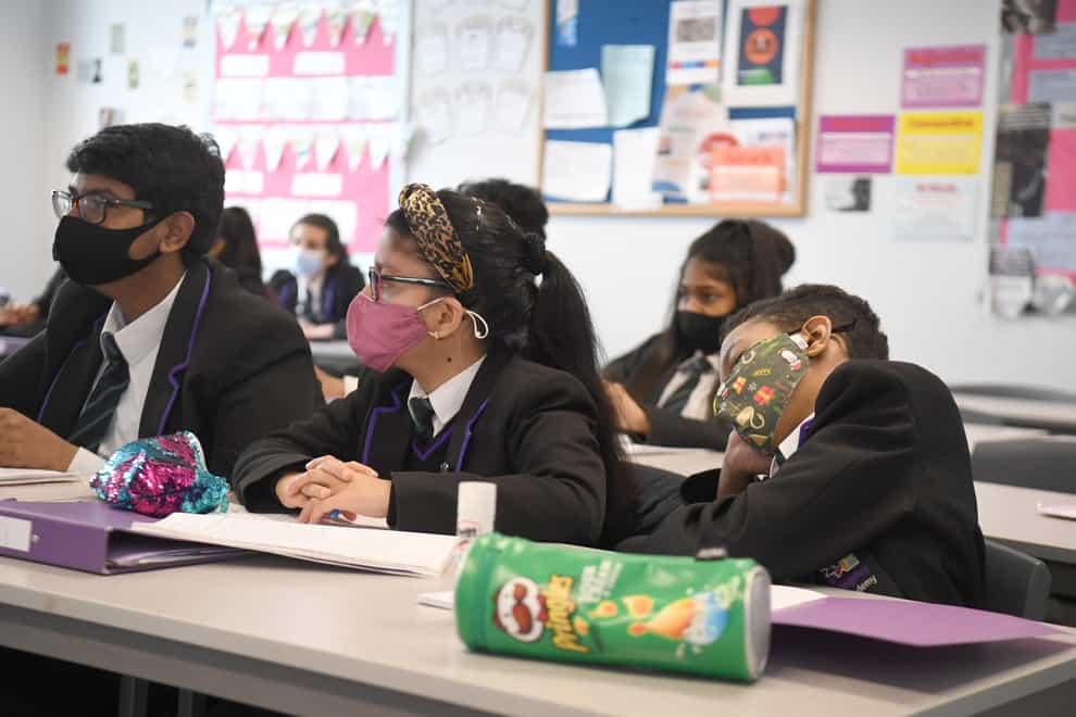 Children wearing face masks during a lesson at Hounslow Kingsley Academy in West London (Kirsty O'Connor/PA)