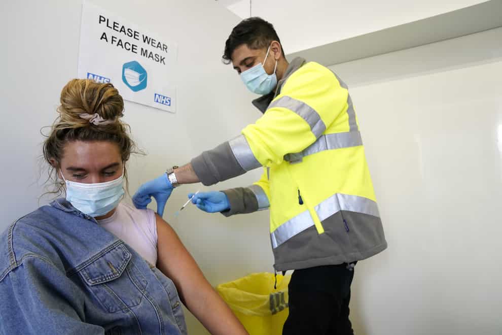 A woman receives her Covid-19 vaccination
