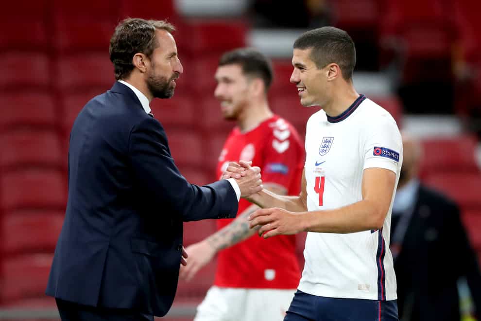 Gareth Southgate shakes hands with Conor Coady