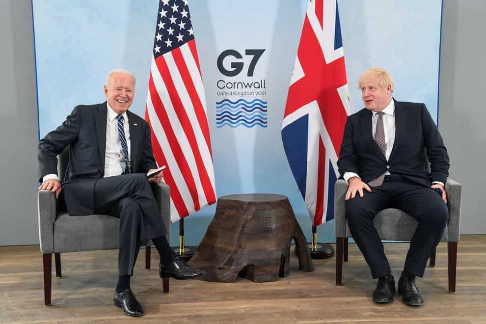 US President Joe Biden talks with Prime Minister Boris Johnson
