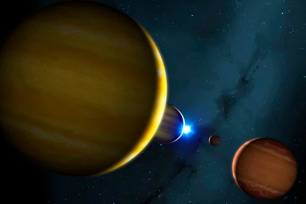 Artist's impression of the four planets of the HR 8799 system and its star