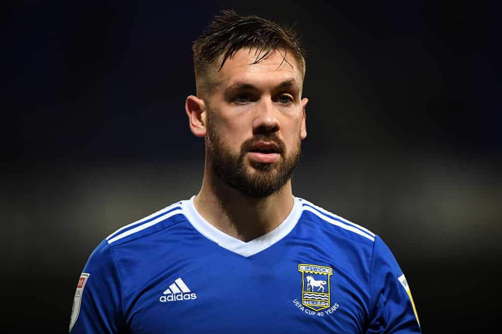 Colchester have signed former Ipswich captain Luke Chambers