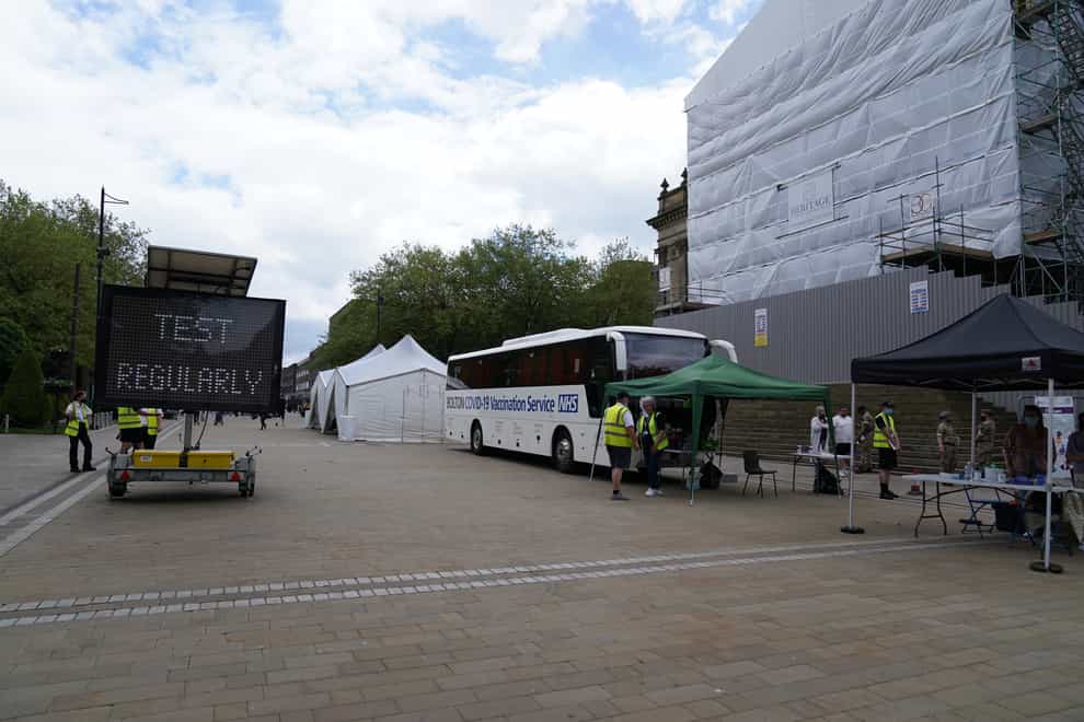 A mobile Covid-19 vaccination centre outside Bolton Town Hall (Peter Byrne/PA)