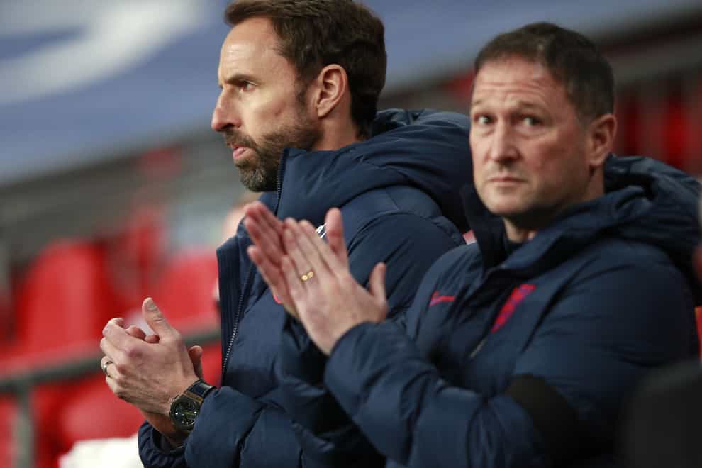 England manager Gareth Southgate (left) and assistant Steve Holland