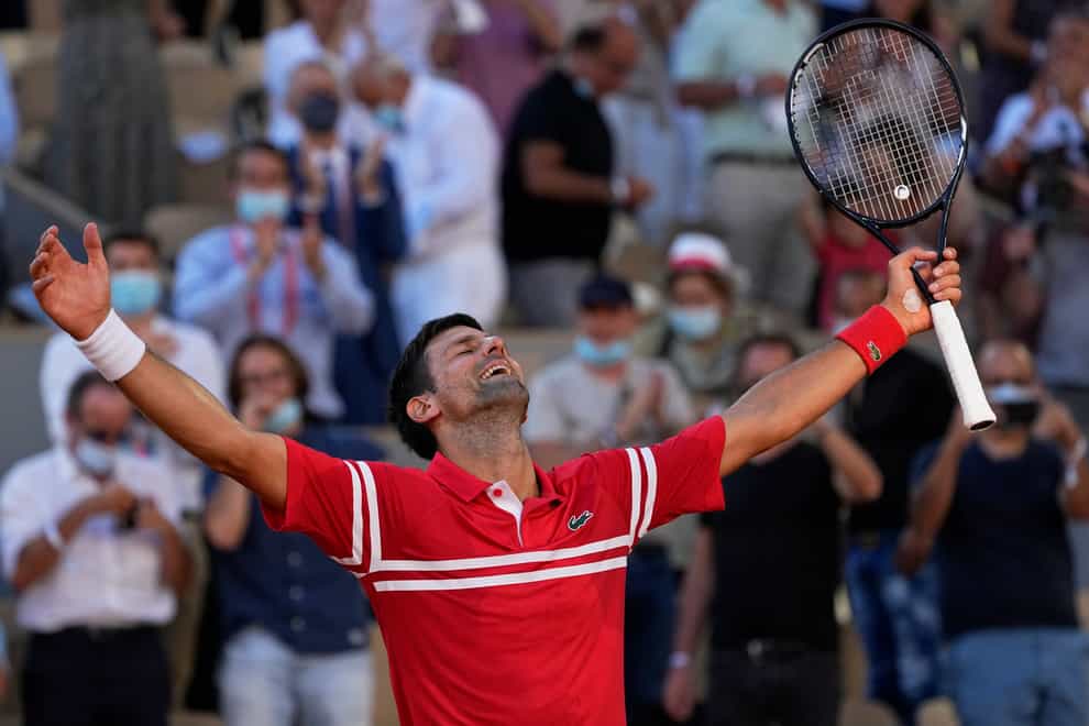 Novak Djokovic celebrates his 19th grand slam title