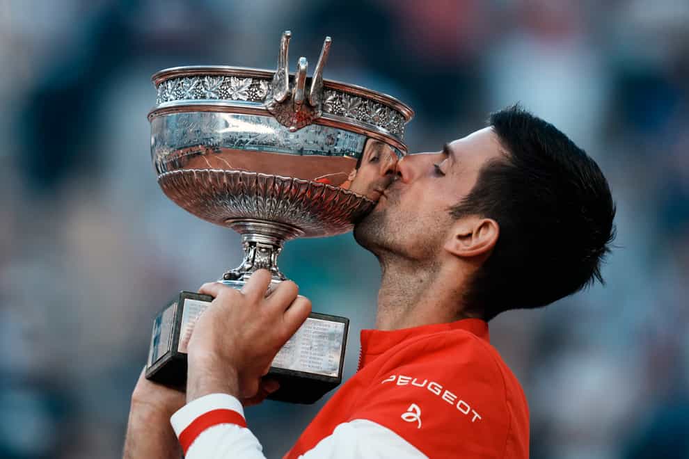 Novak Djokovic kisses the Coupe des Mousquetaires