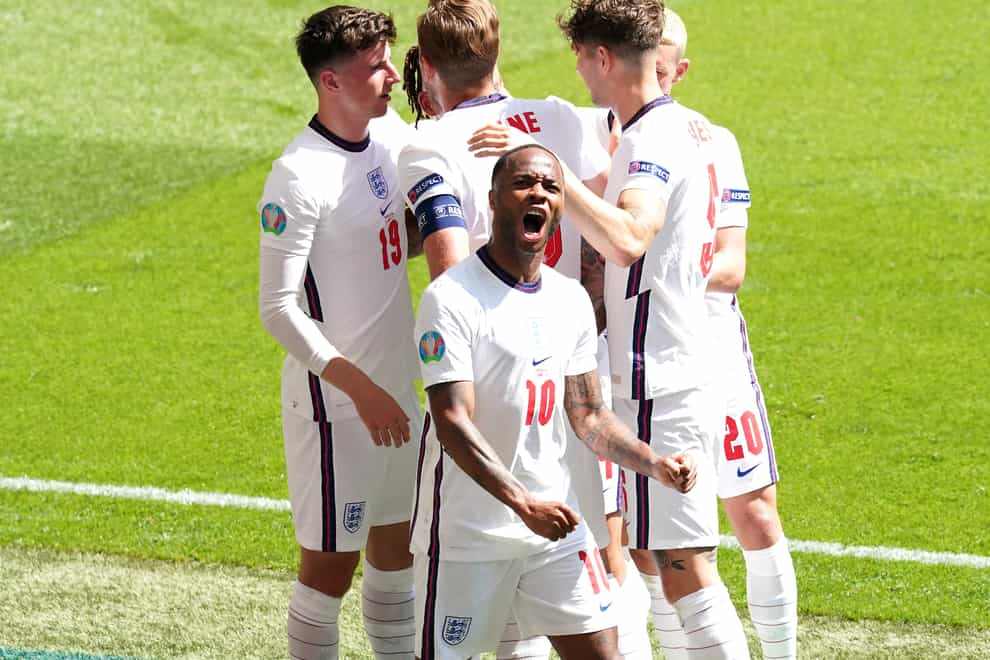 England’s Raheem Sterling (centre) celebrates scoring