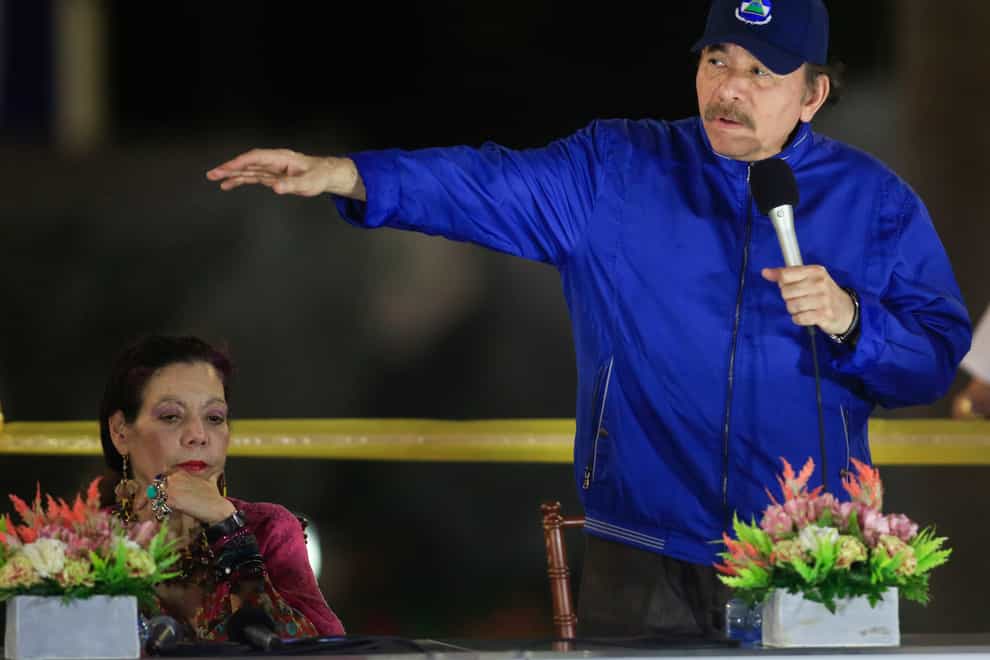 Nicaragua’s President Daniel Ortega speaks next to first lady and Vice President Rosario Murillo (Alfredo Ziuniga/AP)