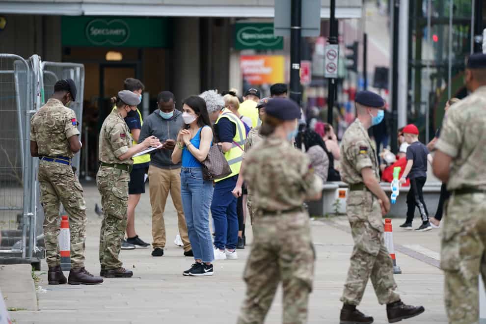 Members of the Armed Forces at a mobile Covid-19 vaccination centre outside Bolton town hall (Peter Byrne/PA)