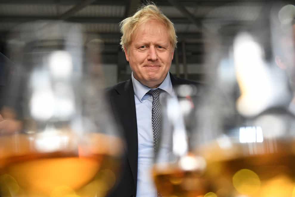 Boris Johnson at a whisky distillery