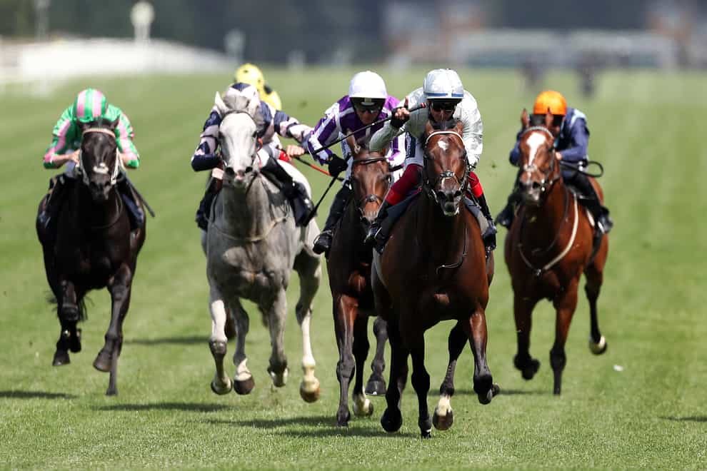 Palace Pier and Frankie Dettori (second right) on their way to winning the Queen Anne Stakes at Royal Ascot