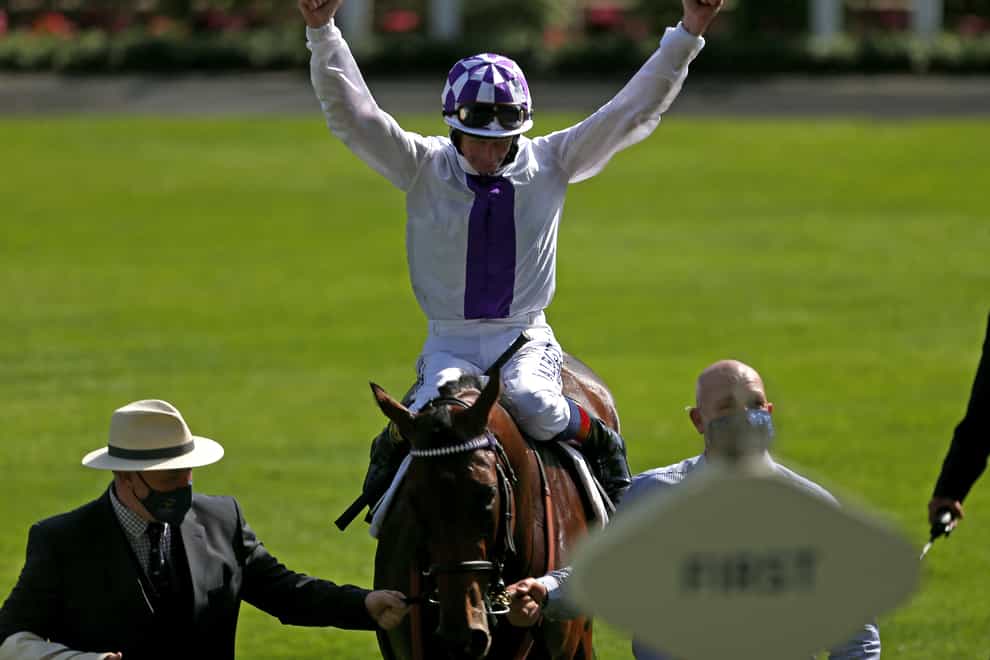 Jockey Kevin Manning celebrates Poetic Flare's breath-taking victory in the St James’s Palace Stakes at Royal Ascot