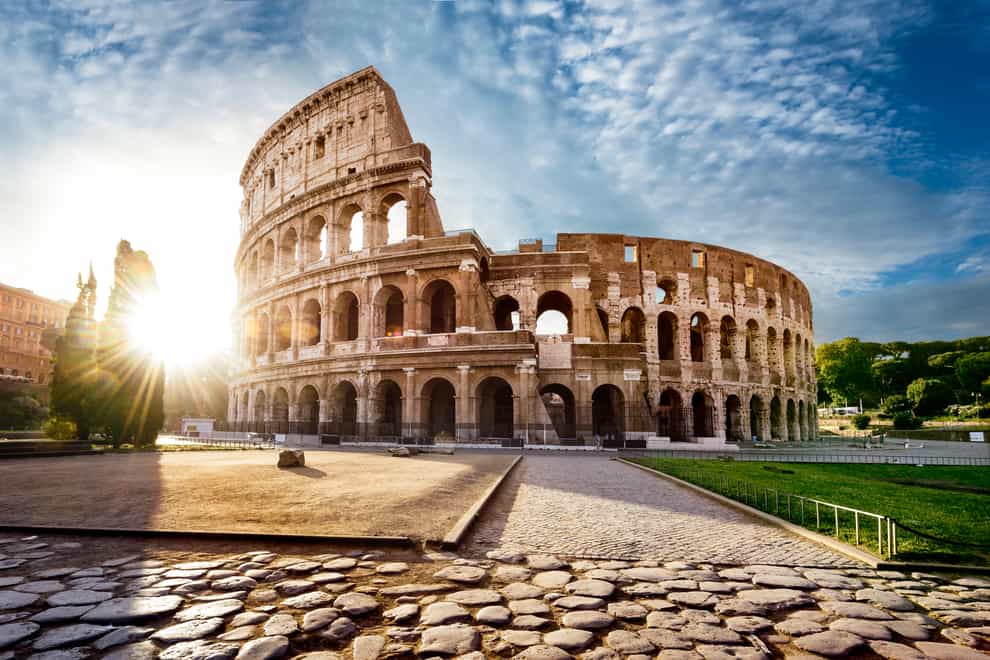 Colosseum in Rome and morning sun, Italy (Alamy/PA)
