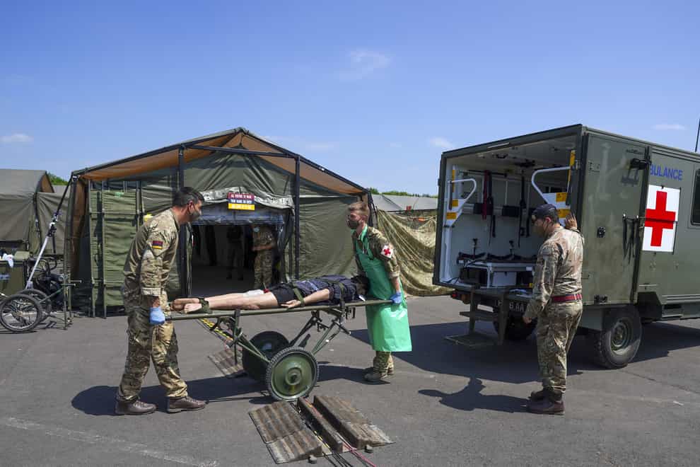 Medical staff from the military services during a test of the Army Medical Service’s Mytchett based 22 Field Hospital, at Barton Stacey in Hampshire