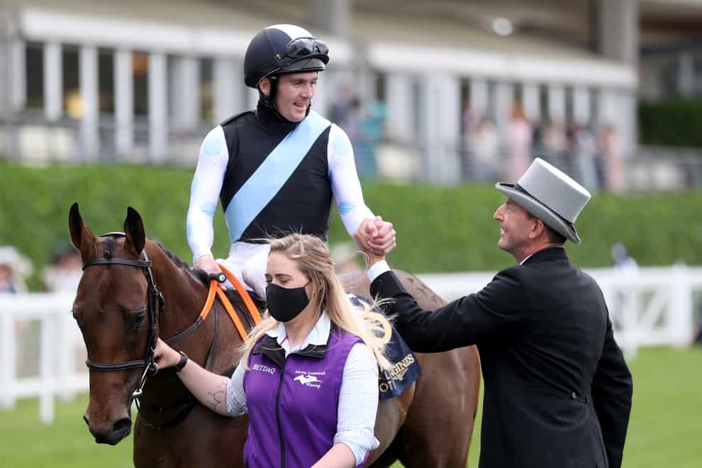 Jockey Gary Carroll and trainer Gavin Cromwell celebrate after Quick Suzy's victory in the Queen Mary Stakes at Royal Ascot