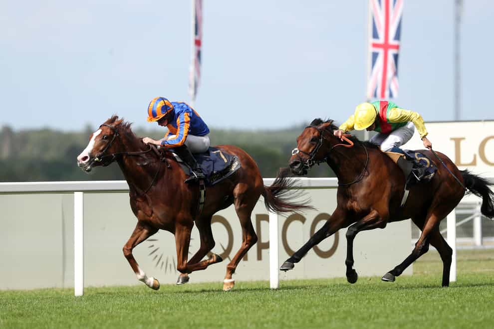 Love and Ryan Moore (left) fend off Audarya to win the Prince Of Wales’s Stakes at Royal Asco