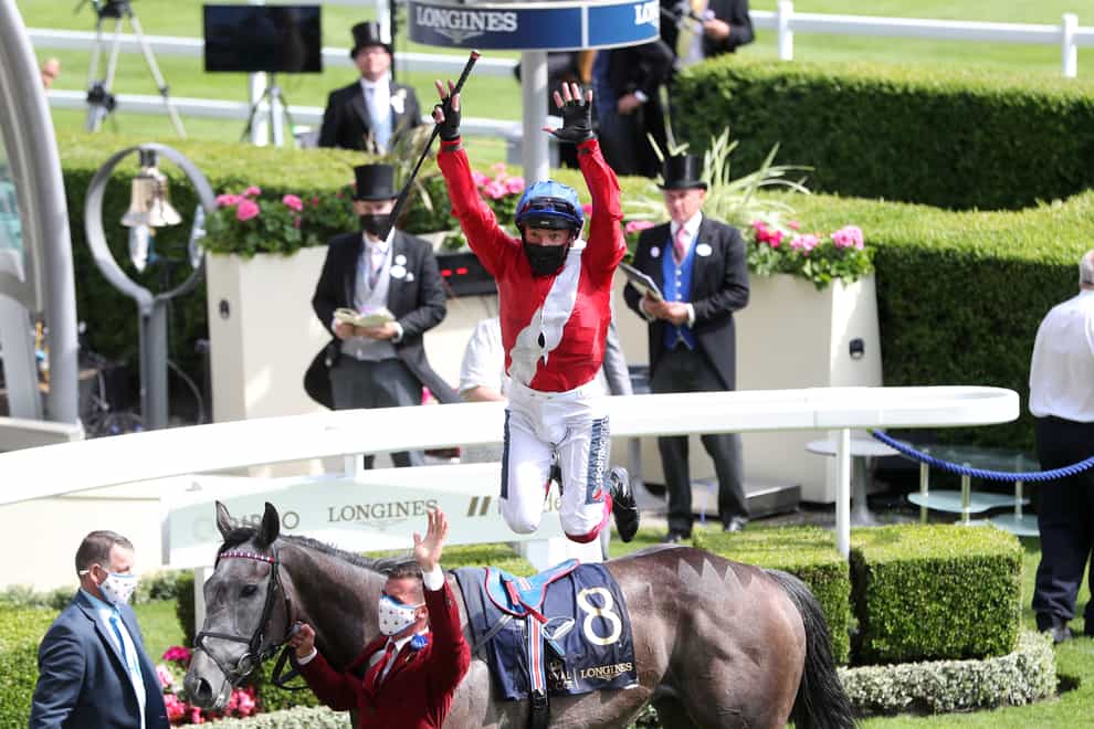 Frankie Dettori leaps from Indie Angel to celebrate winning the Duke Of Cambridge Stakes at Royal Ascot