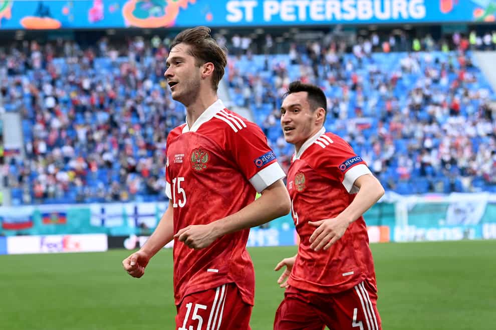 Russia’s Aleksei Miranchuk, front, celebrates after scoring the winner against Finland