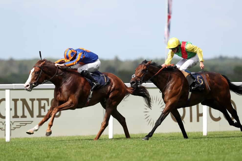 Love and Ryan Moore (left) had to battle hard to beat Audarya in the Prince of Wales’s Stakes at Royal Ascot