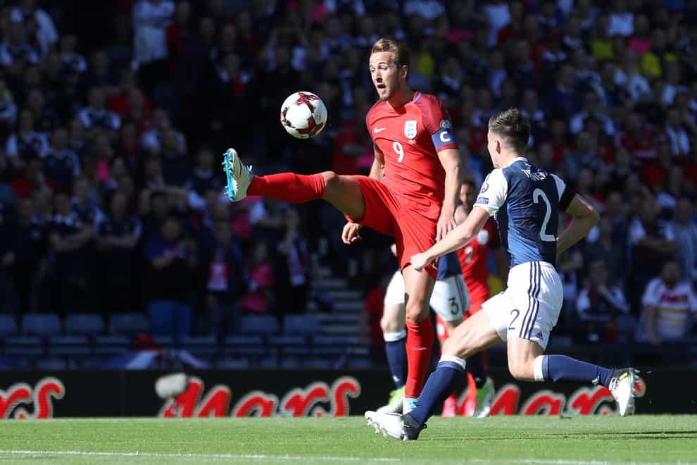 England’s Harry Kane (left) and Scotland’s Kieran Tierney battle for the ball in 2017