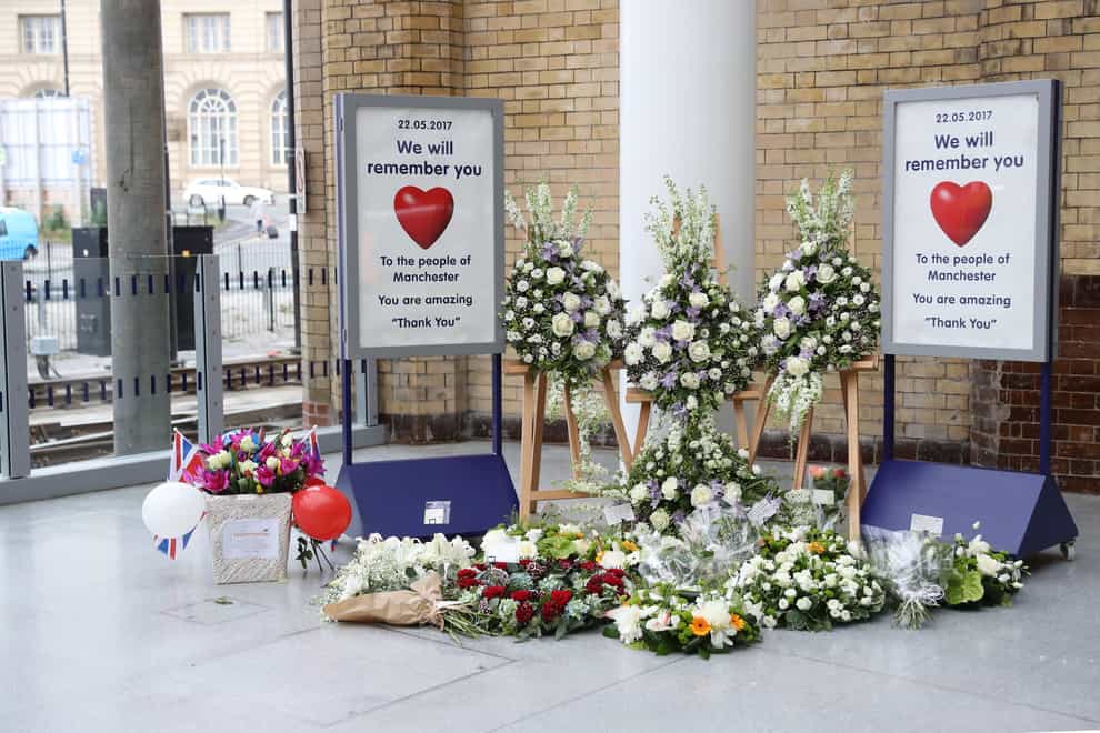 Floral tributes at Manchester Victoria railway station after the terror attack on the adjacent Manchester Arena